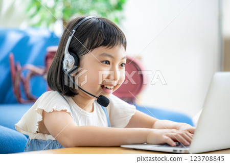 Girls taking classes online Girls taking classes online 123708845