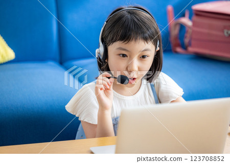 Girls taking classes online Girls taking classes online 123708852