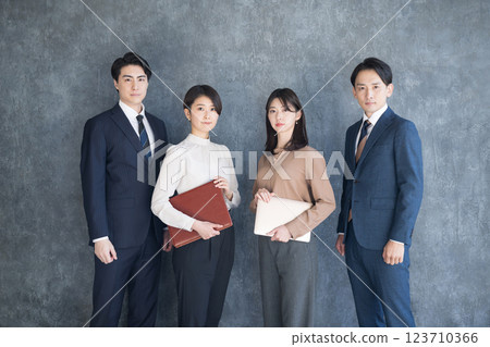 Four businessmen standing side by side - Image of consultants, real estate agents, professionals, etc. 123710366