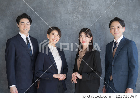 Four businessmen standing side by side - Image of consultants, real estate agents, professionals, etc. Four businessmen standing side by side - Image of consultants, real estate agents, professionals, etc. 123710367