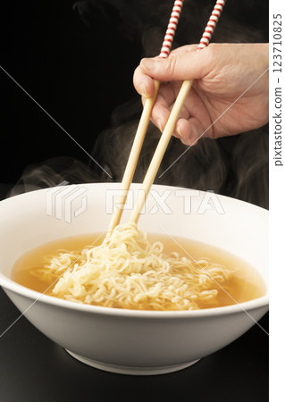 Ramen without toppings. Pour the soup into a bowl and add the noodles. Ramen without toppings. Pour the soup into a bowl and add the noodles. 123710825