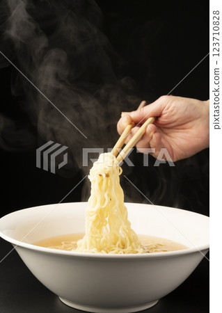 Ramen without toppings. Pour the soup into a bowl and add the noodles. 123710828