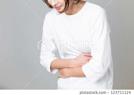 Middle-aged woman suffering from stomachache 123711124