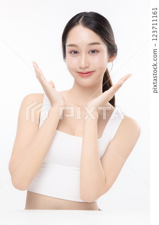 Close up facial of young Asian beautiful woman with K-beauty make up style and healthy and perfect glow skin with copyspace isolated on white background for skincare commercial product advertising. Close up facial of young Asian beautiful woman with K-beauty make up style and healthy and perfect glow skin with copyspace isolated on white background for skincare commercial product advertising. 123711161