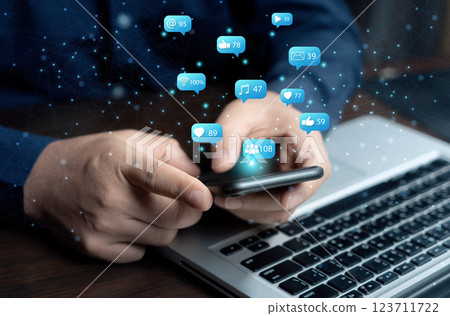 Businessman hand using a smartphone and show technology icons on social media. Concept social network. chat, emotion, email, contract. Businessman hand using a smartphone and show technology icons on social media. Concept social network. chat, emotion, email, contract. 123711722