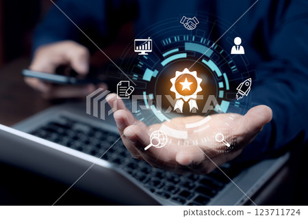 Business people holding a sign of the top service quality assurance. Leading services ISO Certification Document Management System. The best quality assurance. 123711724