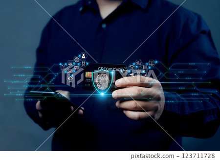 Credit card cybersecurity and privacy to protect data. Businessman protecting personal information. Fingerprint lock icon and internet network security technology. Credit card cybersecurity and privacy to protect data. Businessman protecting personal information. Fingerprint lock icon and internet network security technology. 123711728