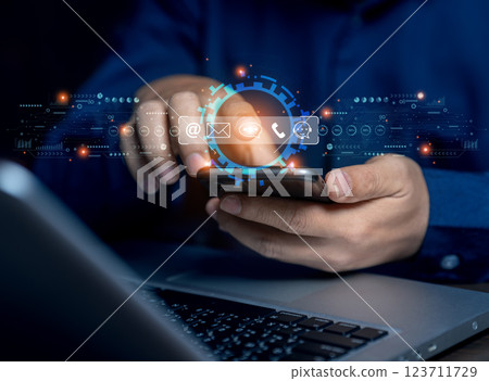 Contact us or the customer support hotline to connect. Businessman touching on virtual screen contact icons. Connecting line, email, AI chat, internet. 123711729