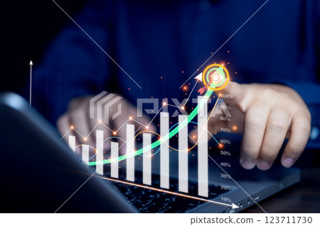 A businessman investor analyzes the profitability of working companies with digital augmented reality graphics and positive indicators. business planning and stock investment growth concept. 123711730