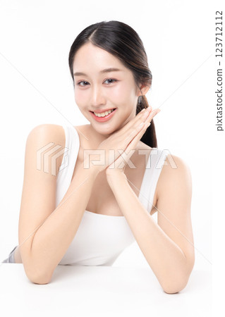 Close-up portrait of young Asian beautiful woman with K-beauty make up style and healthy and perfect skin isolated on white background for skincare commercial product advertising. Close-up portrait of young Asian beautiful woman with K-beauty make up style and healthy and perfect skin isolated on white background for skincare commercial product advertising. 123712112