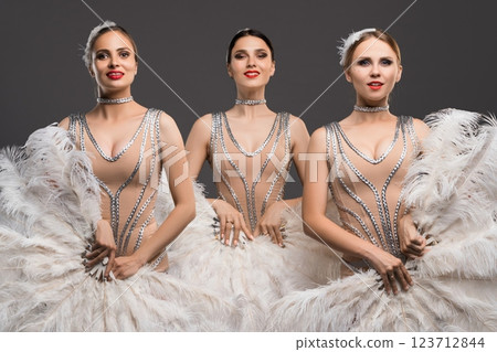 Elegant performers showcase graceful artistry in stunning costumes 123712844