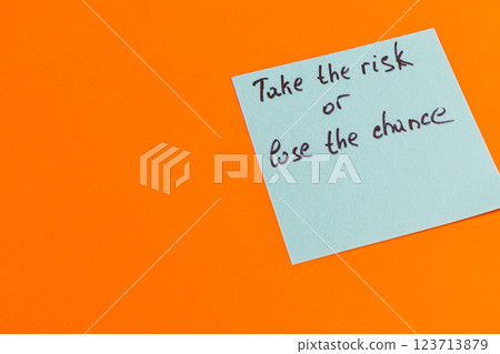 Bright motivational note encourages taking risks for a fulfilled life Bright motivational note encourages taking risks for a fulfilled life 123713879