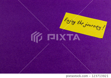 Encouraging note on vibrant purple for positivity in all journeys 123713921