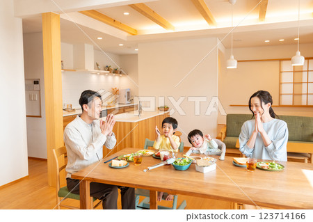 Young family eating at the table 123714166