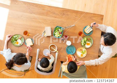 Young family eating at the table 123714167