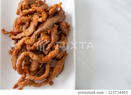 Sun-Dried Pork on white plate 123714903