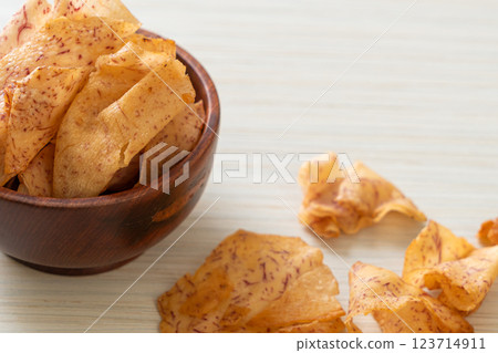 Taro Chips - fried or baked sliced taro Taro Chips - fried or baked sliced taro 123714911