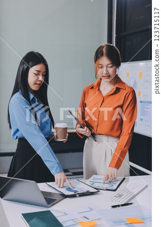 Entrepreneurs and business people conference in modern meeting room, happy multiracial coworkers have fun cooperating working together at office meeting, asian teamwork concept Entrepreneurs and business people conference in modern meeting room, happy multiracial coworkers have fun cooperating working together at office meeting, asian teamwork concept 123715117