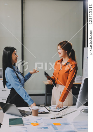 Entrepreneurs and business people conference in modern meeting room, happy multiracial coworkers have fun cooperating working together at office meeting, asian teamwork concept Entrepreneurs and business people conference in modern meeting room, happy multiracial coworkers have fun cooperating working together at office meeting, asian teamwork concept 123715118