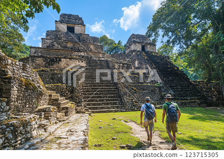 Tourists exploring ancient ruins 123715305