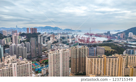 Feb 23 2025 View of Modern Urban Cityscape with River and Mountains 123715349
