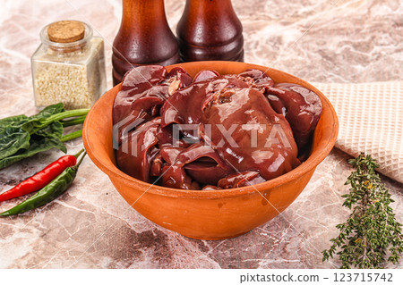 Raw uncokked chicken liver in the bowl Raw uncokked chicken liver in the bowl 123715742