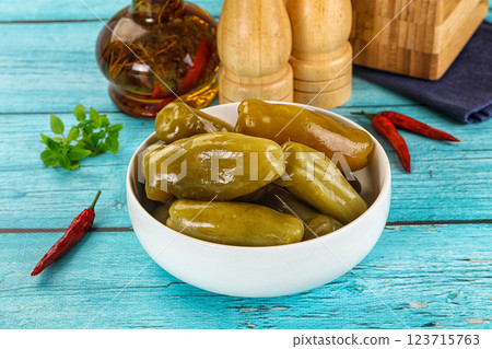 Homemade pickled green tomato heap 123715763