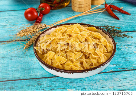 Raw dry farfalle for cooking Raw dry farfalle for cooking 123715765
