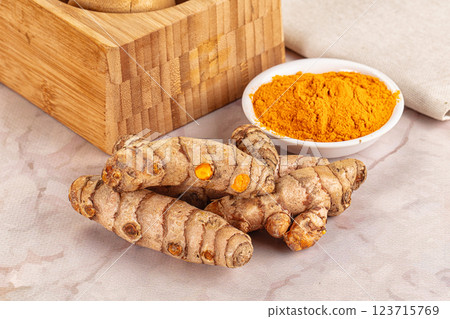 Fresh aroma tumeric roots heap Fresh aroma tumeric roots heap 123715769