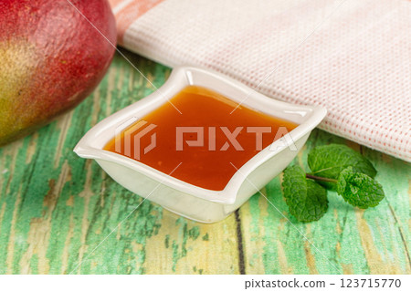 Sweet dessert orange mango puree 123715770