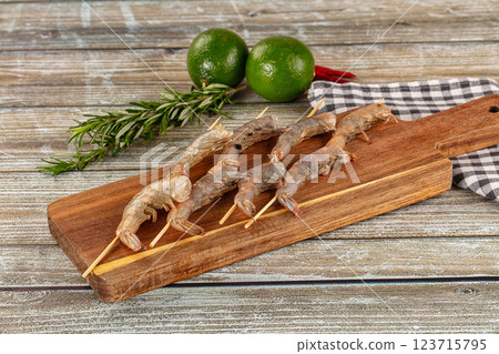Raw shrimp skewer for grill 123715795
