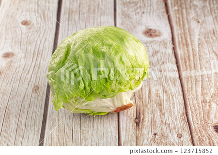 Raw iceberg salat over background Raw iceberg salat over background 123715852