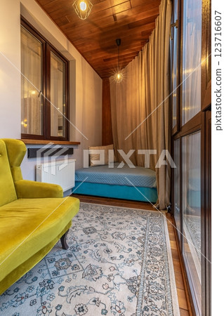 Cozy Corner with Yellow Armchair and Blue Mattress 123716607