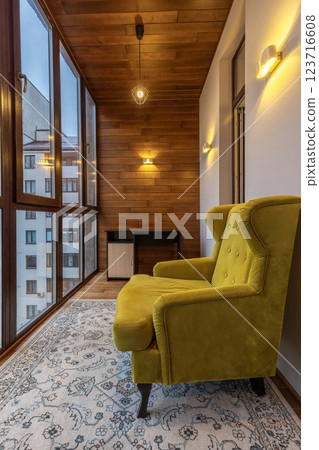 Cozy Corner with Yellow Armchair and Wooden Interior 123716608