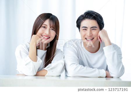 Smiling men and women standing side by side Smiling men and women standing side by side 123717191