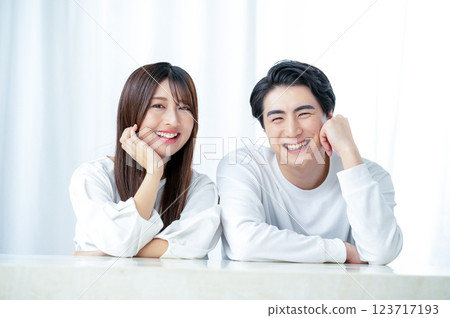 Smiling men and women standing side by side Smiling men and women standing side by side 123717193