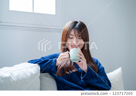 A woman with a mug A woman with a mug 123717205