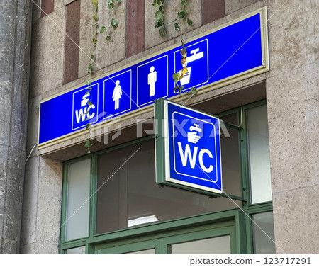 Signs of the public restroom at the station building 123717291