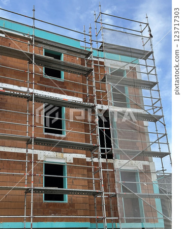 Construction of a new aparment building in the city Construction of a new aparment building in the city 123717303