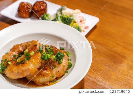 Meat rolls with onion sauce and dinner table Meat rolls with onion sauce and dinner table 123719640