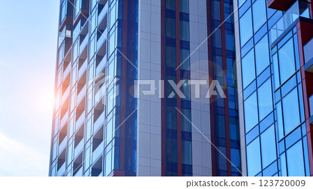 Modern and new apartment building. Multistoried modern, new and stylish living block of flats. Modern and new apartment building. Multistoried modern, new and stylish living block of flats. 123720009
