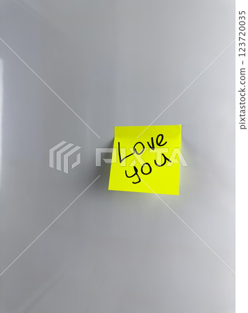 Vertical photo romantic sticky note with love message 123720035