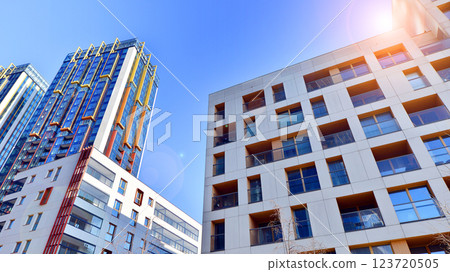 Modern and new apartment building. Multistoried modern, new and stylish living block of flats. 123720505