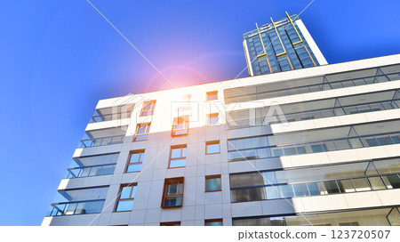 Modern and new apartment building. Multistoried modern, new and stylish living block of flats. 123720507