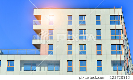 Modern and new apartment building. Multistoried modern, new and stylish living block of flats. 123720513