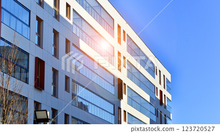 Modern and new apartment building. Multistoried modern, new and stylish living block of flats. Modern and new apartment building. Multistoried modern, new and stylish living block of flats. 123720527