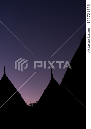 Silhouette of Waerebo's house in the evening 123721336