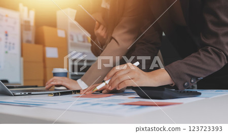 Accounting company provide finance and taxation planning for profitable cash flow, Auditor and accountant team working in office, analyze financial data and accounting record with calculator.Insight Accounting company provide finance and taxation planning for profitable cash flow, Auditor and accountant team working in office, analyze financial data and accounting record with calculator.Insight 123723393