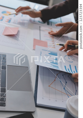 Accounting company provide finance and taxation planning for profitable cash flow, Auditor and accountant team working in office, analyze financial data and accounting record with calculator.Insight Accounting company provide finance and taxation planning for profitable cash flow, Auditor and accountant team working in office, analyze financial data and accounting record with calculator.Insight 123723394