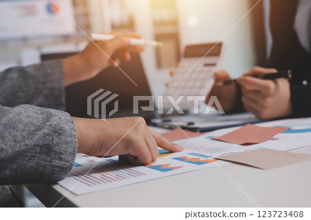 Accounting company provide finance and taxation planning for profitable cash flow, Auditor and accountant team working in office, analyze financial data and accounting record with calculator.Insight 123723408